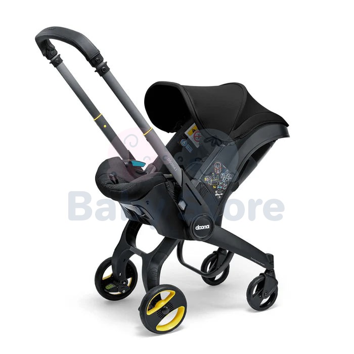 DOONA I i-Size Nitro Black automobilinė kėdutė–vežimėlis