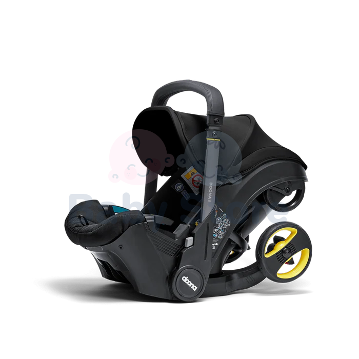 DOONA I i-Size Nitro Black automobilinė kėdutė–vežimėlis